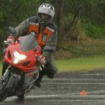 Motorbike riding in rain