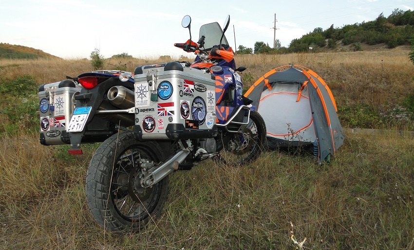 motorcyle parked outside tent