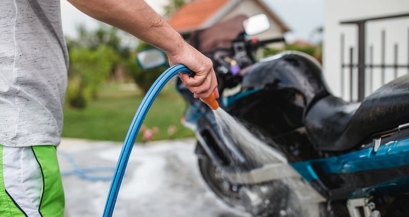 hosing motorbike down