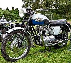 Black and white motorcycle number plate on classic bike.