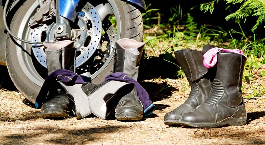 Boots next to motorcycle