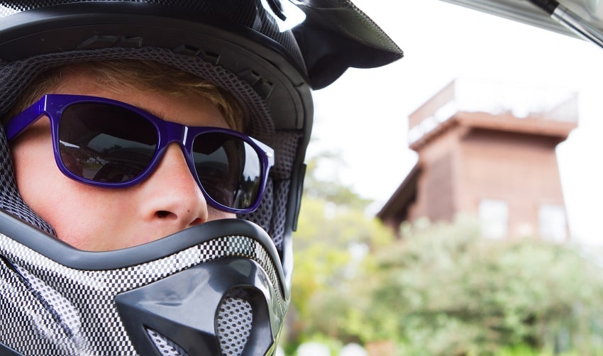 motorcycle rider with helmet and glasses